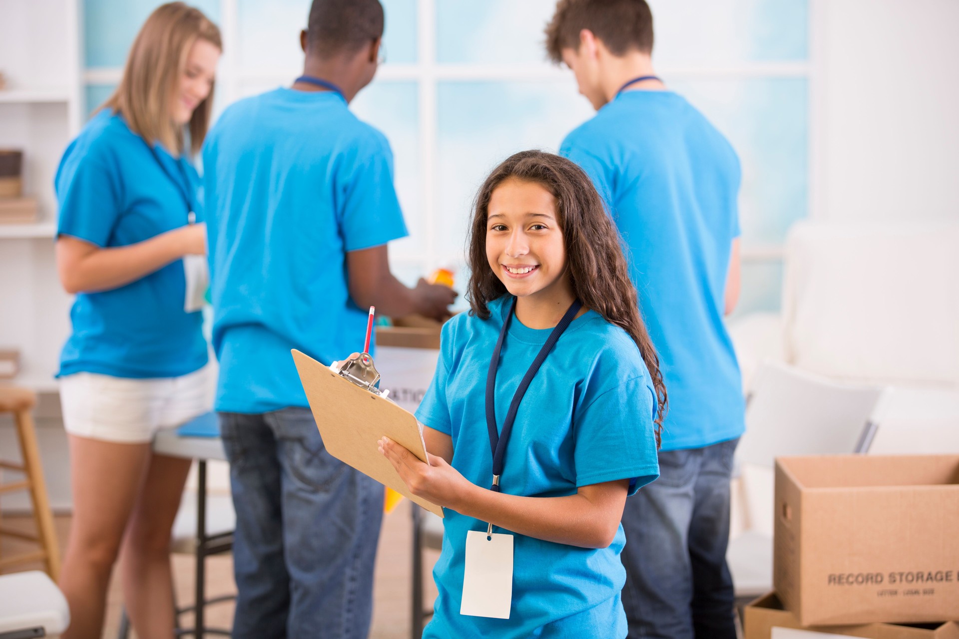 Helping Hands!  Group of teenagers organize local donation event.